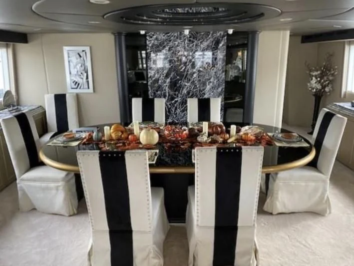 a table with fruit on it aboard SOVEREIGN LADY Yacht for Sale