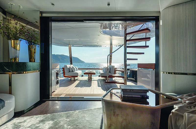 a room with a large window aboard JAKAT Yacht for Sale