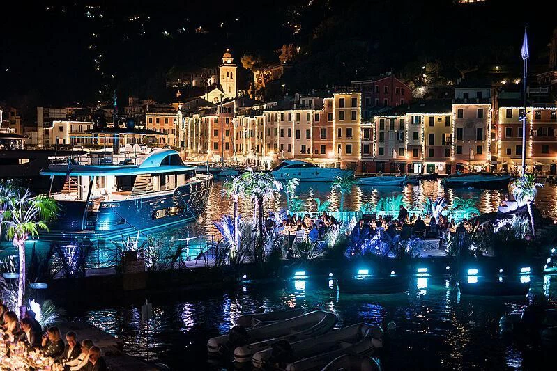 a body of water with boats and buildings along it aboard JAKAT Yacht for Sale