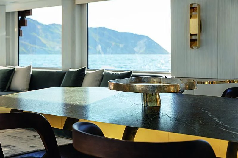 a kitchen with a large window aboard JAKAT Yacht for Sale