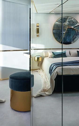 a bed in a room aboard JAKAT Yacht for Sale