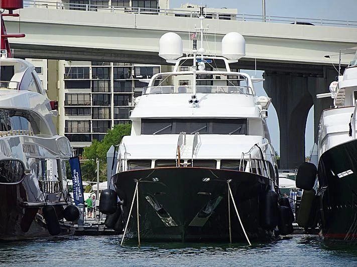 a boat docked in the water aboard ANDIAMO Yacht for Sale