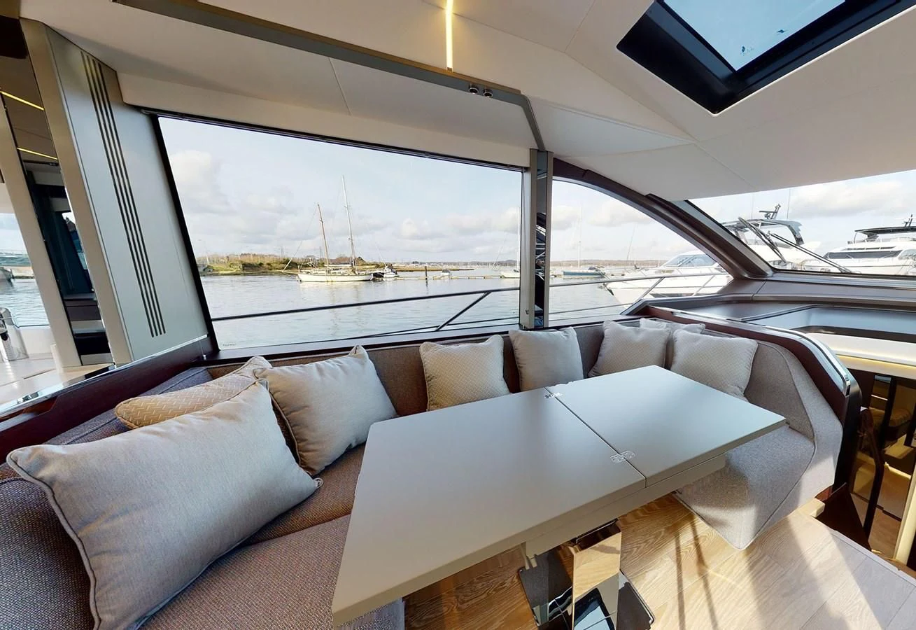 a couch in a car aboard FIVE II Yacht for Sale