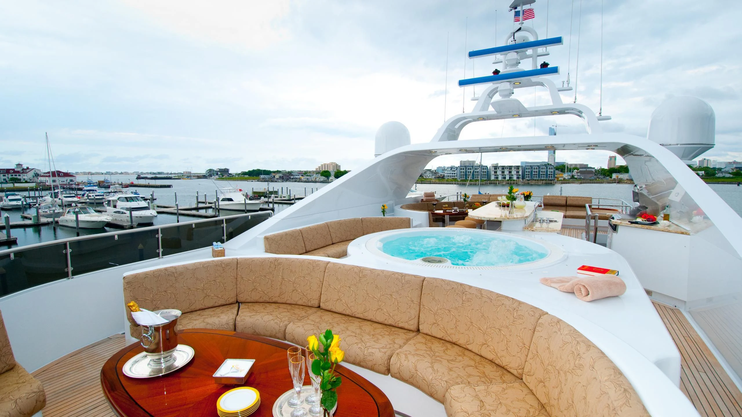 a room with a table and a view of a ship aboard M3 Yacht for Sale