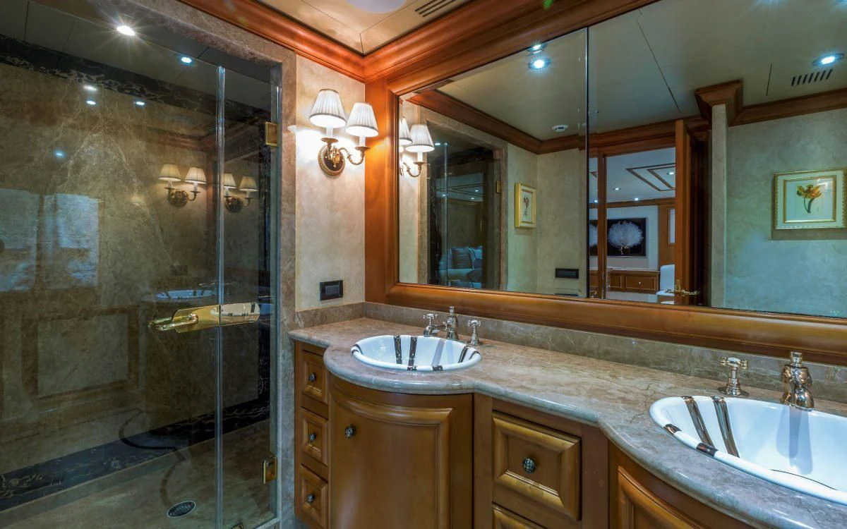 a bathroom with a glass shower aboard M3 Yacht for Sale