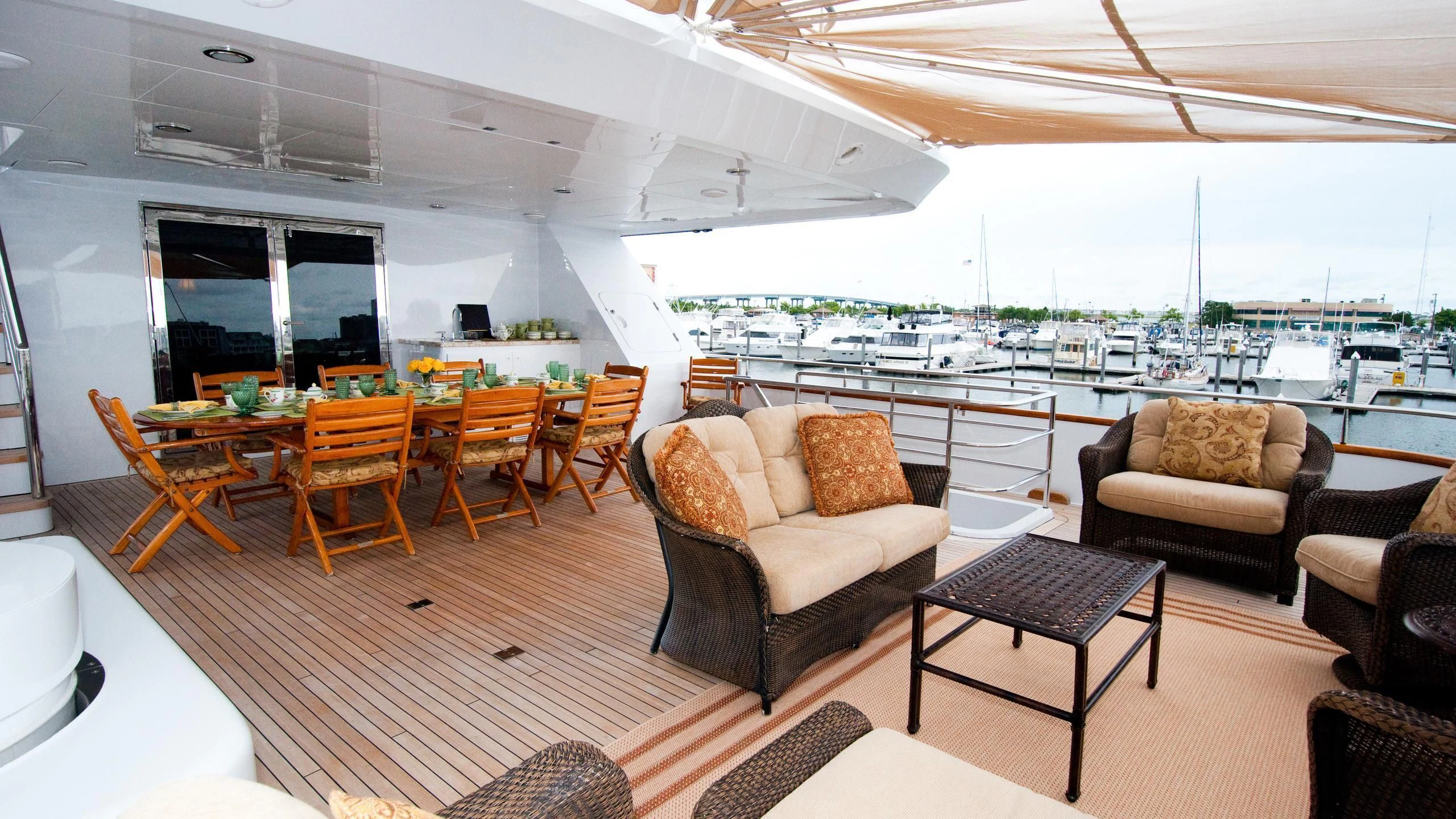 a living room with a large window aboard M3 Yacht for Sale