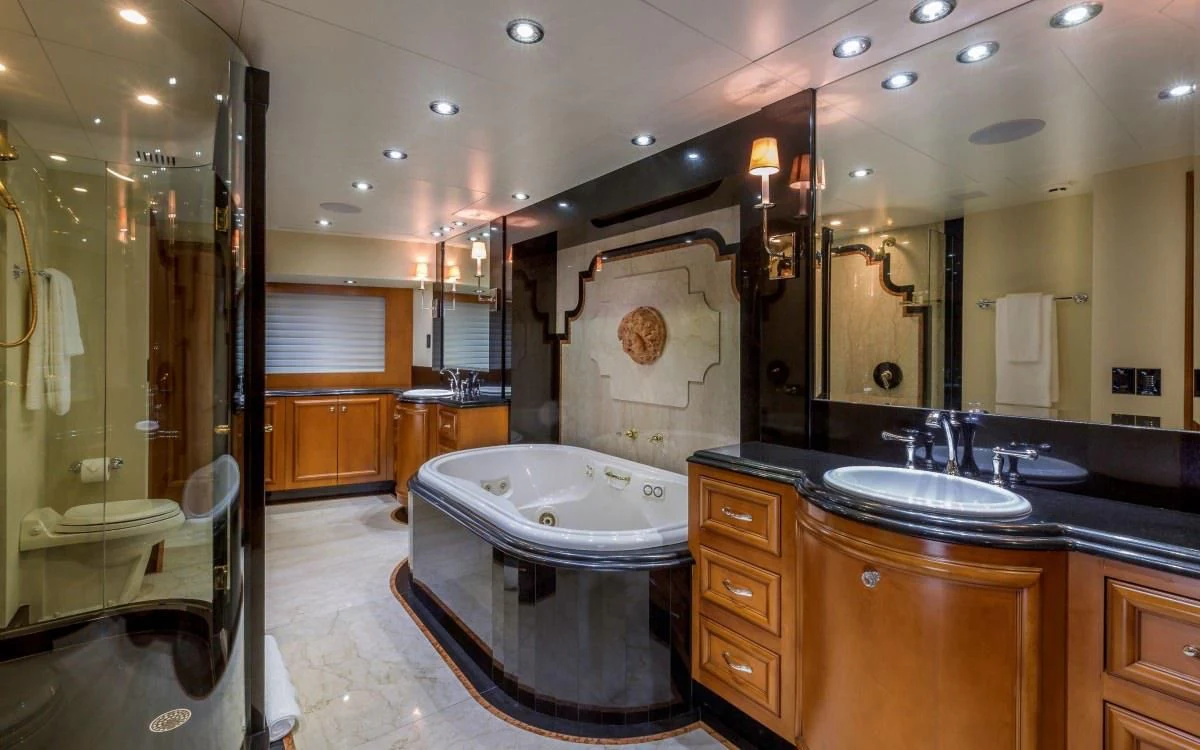 a bathroom with a large tub aboard M3 Yacht for Sale