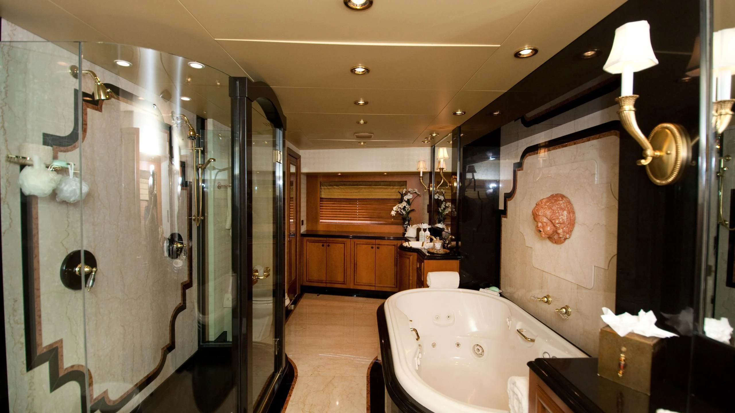 a bathroom with a shower and sink aboard M3 Yacht for Sale