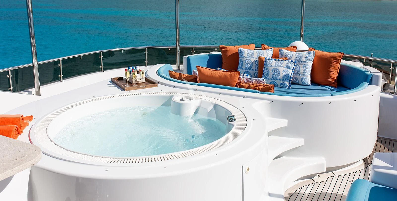 a white bathtub with a blue pillow on it aboard M3 Yacht for Sale