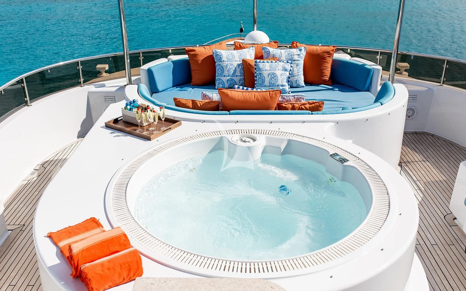 a white bathtub with a blue pillow on it aboard M3 Yacht for Sale