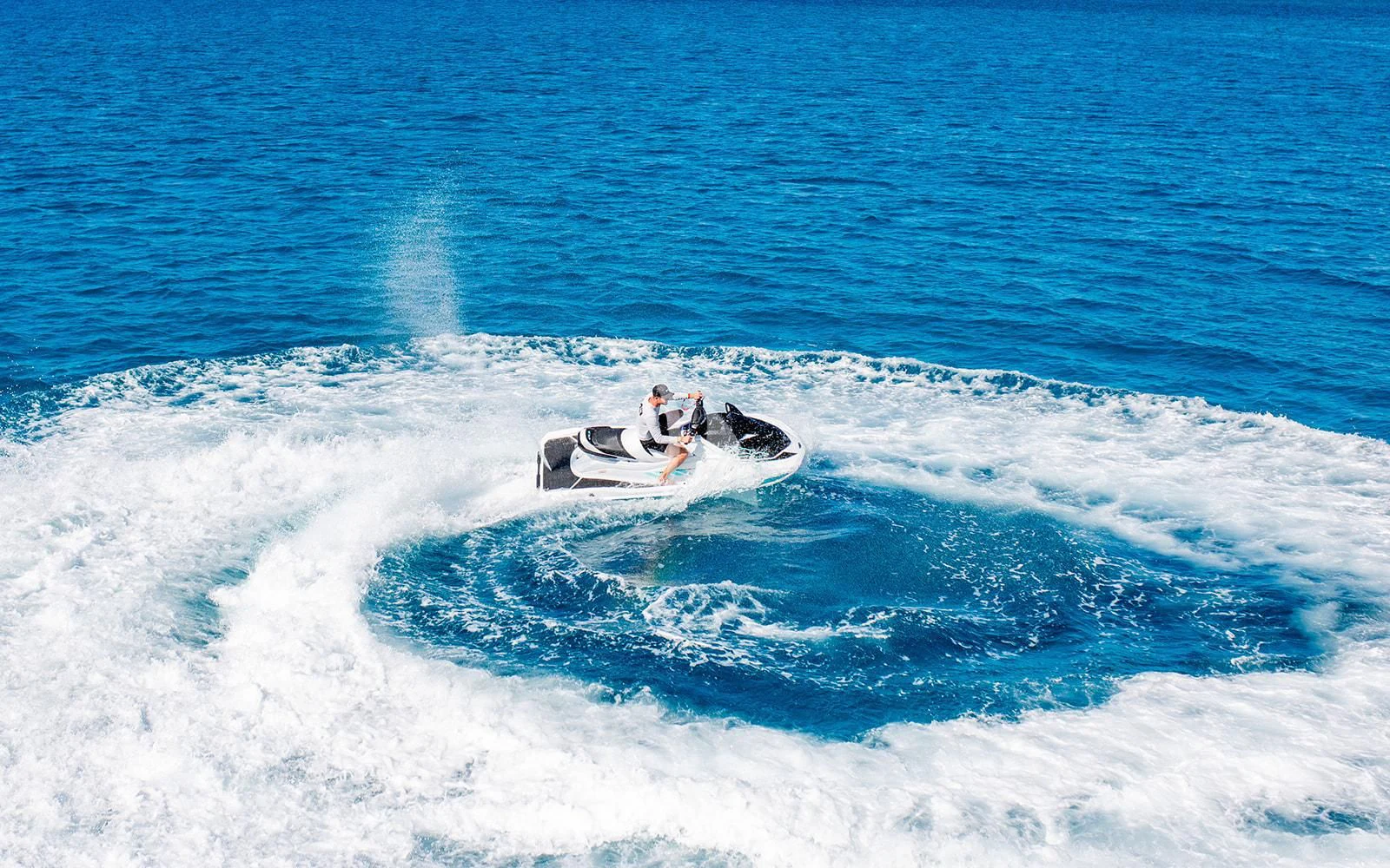 a person surfing on the waves aboard M3 Yacht for Sale