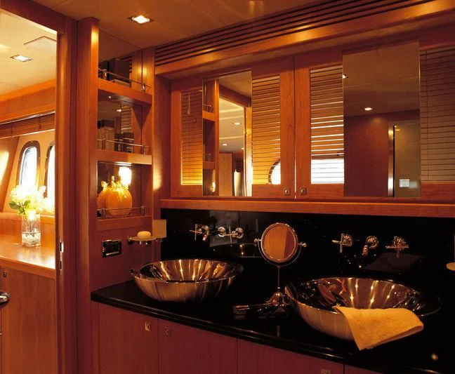 a kitchen with a sink and cabinets aboard M3 Yacht for Sale