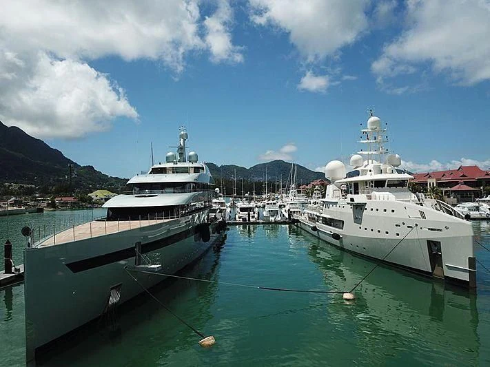boats docked at a pier aboard UM ALHOUL Yacht for Sale