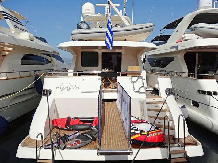 a boat docked at a pier aboard ALANDINI Yacht for Sale