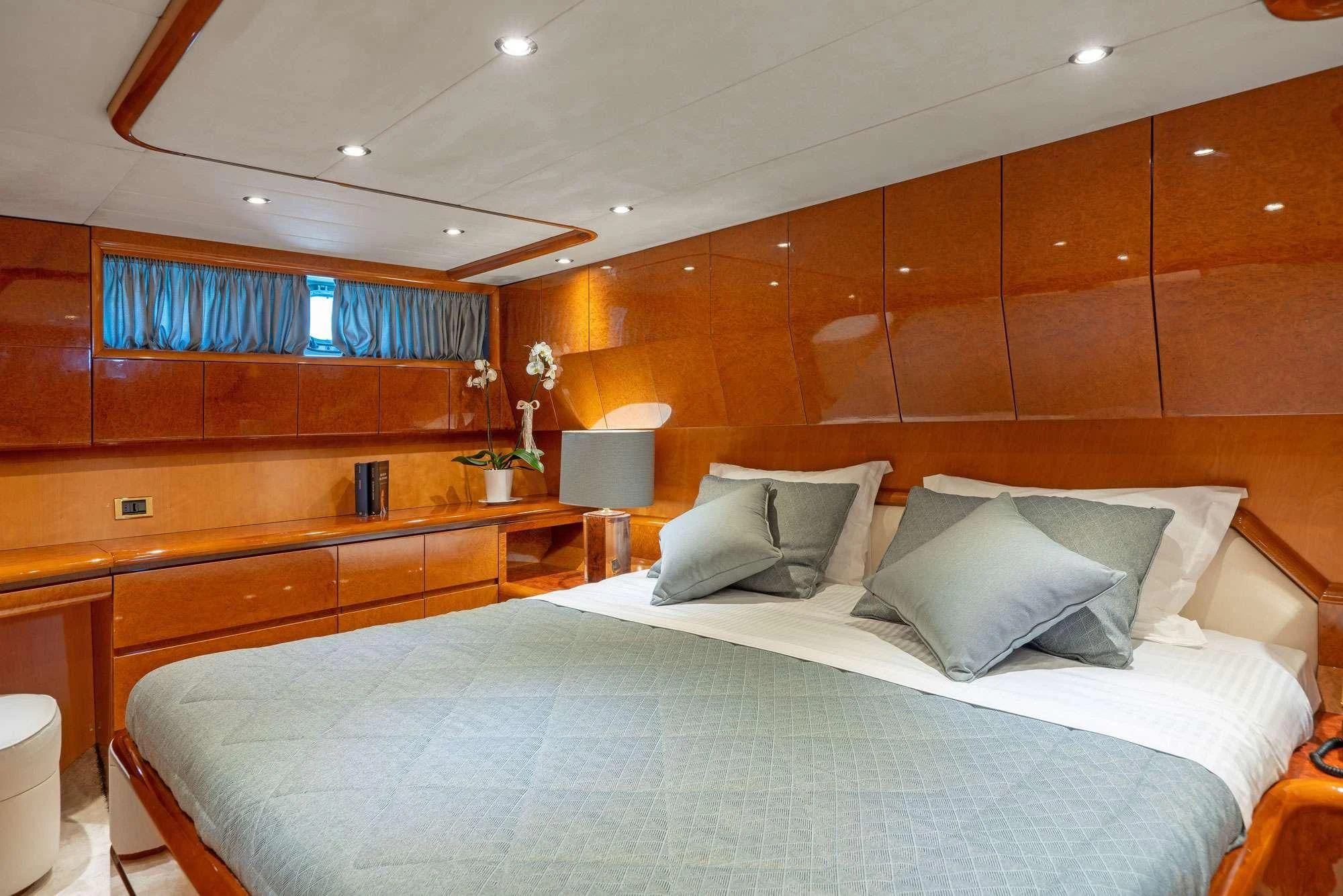 a bed in a room aboard ALANDINI Yacht for Sale