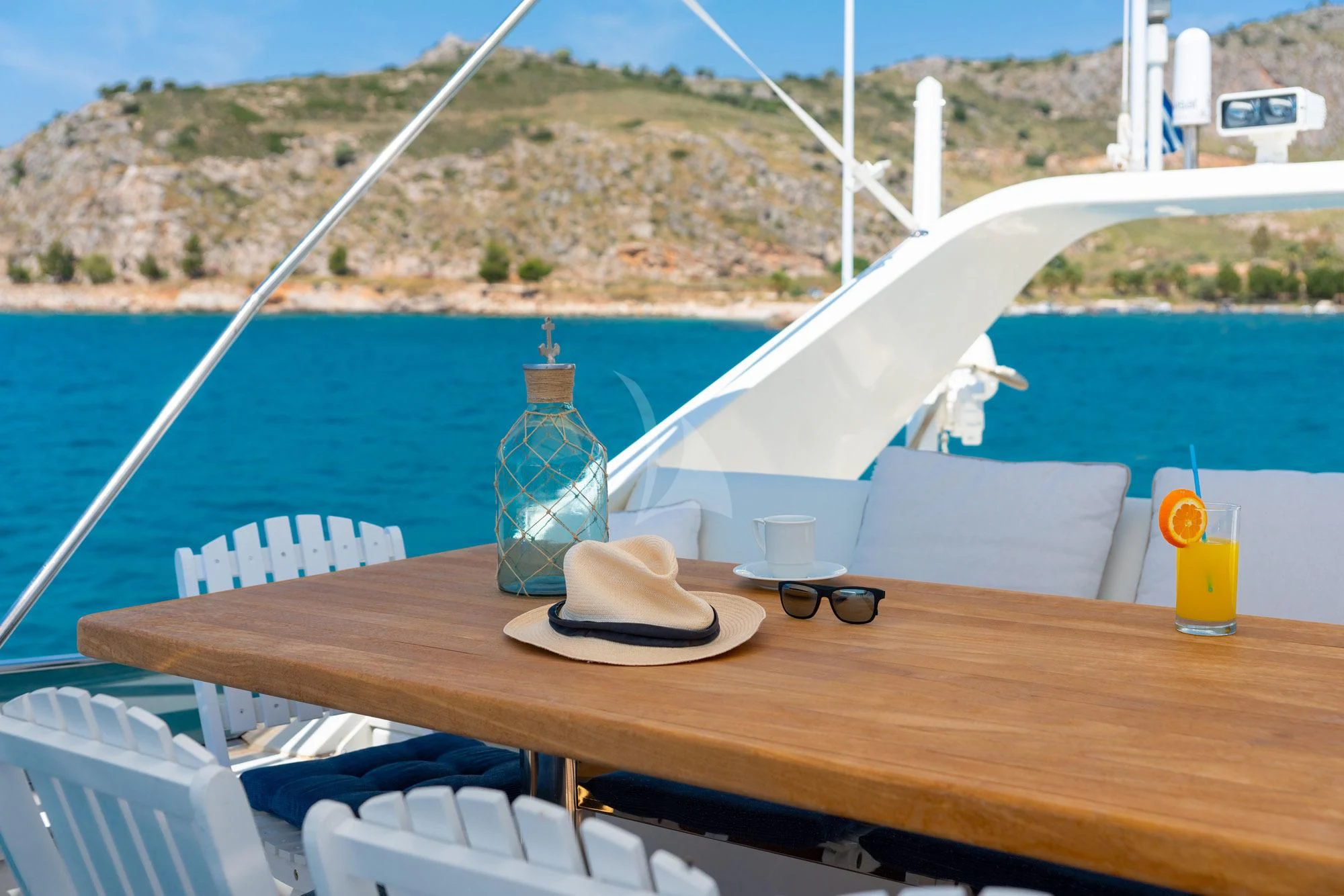 a boat with a straw hat on it aboard ALANDINI Yacht for Sale