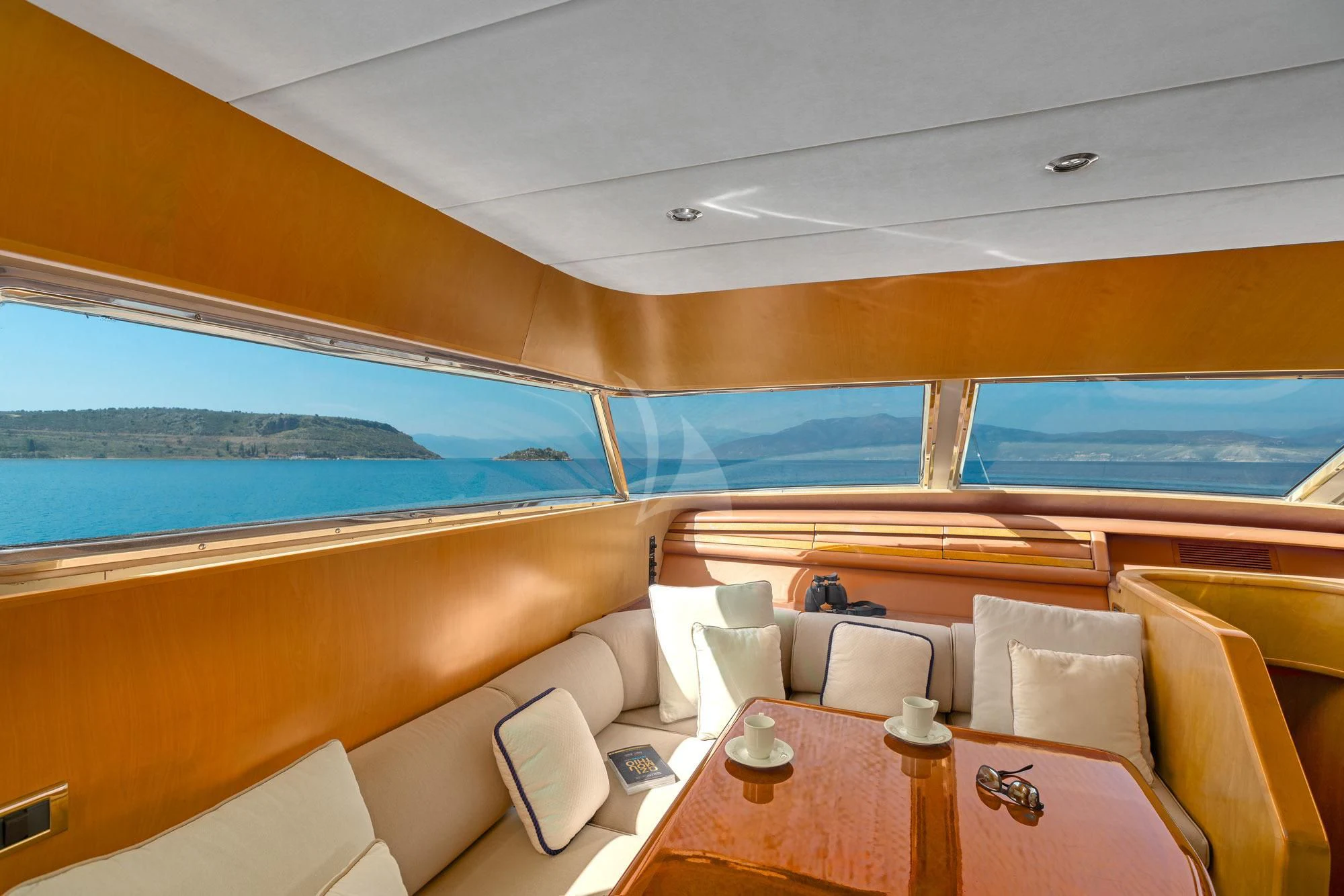 a boat with a table and chairs aboard ALANDINI Yacht for Sale