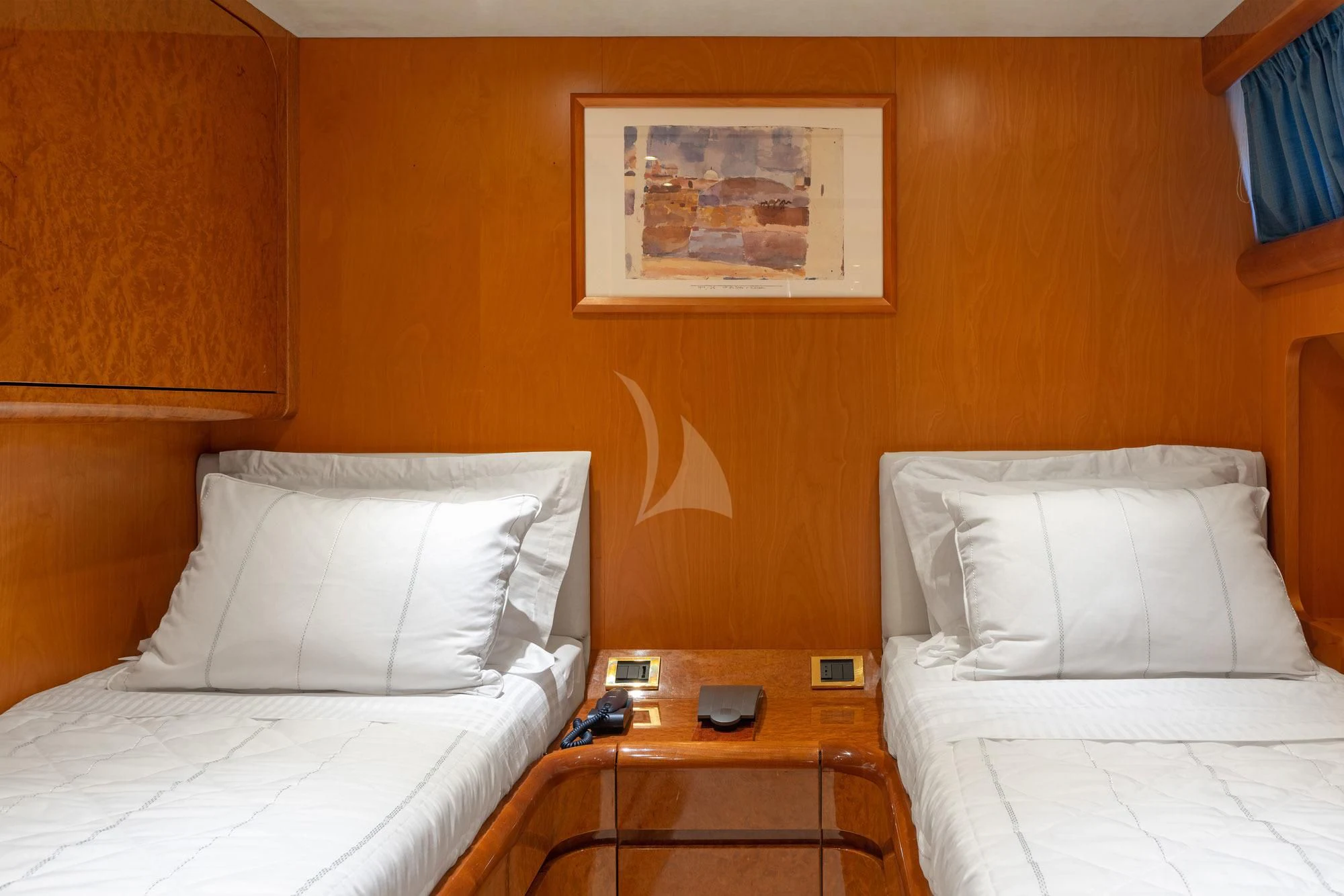 a couple of beds in a hotel room aboard ALANDINI Yacht for Sale