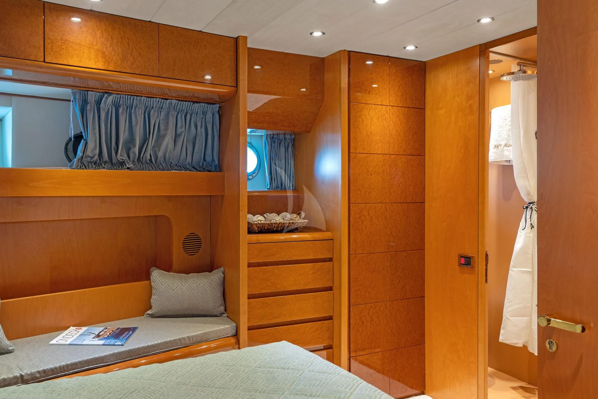 a room with a bed and a desk aboard ALANDINI Yacht for Sale