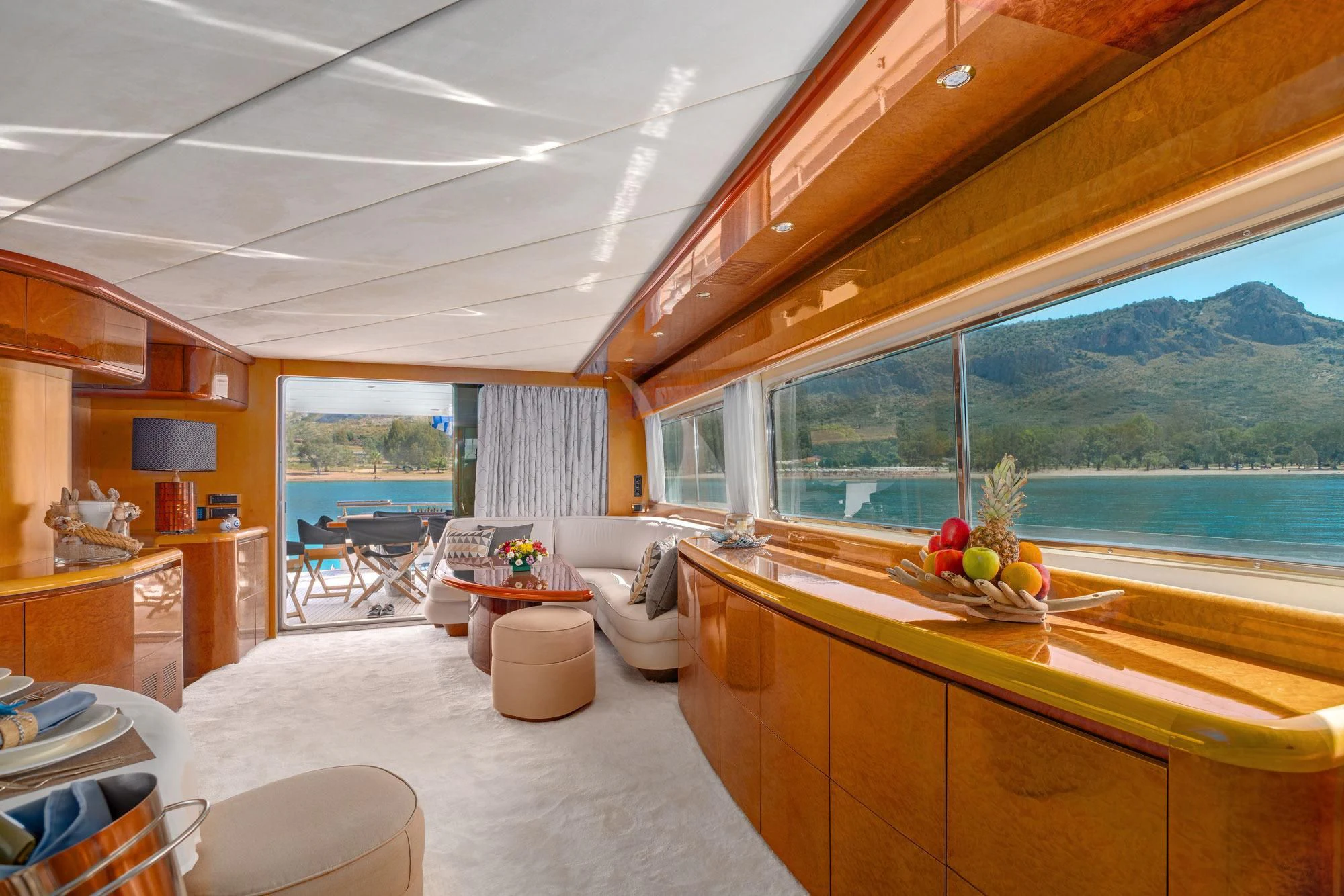 a room with a large window and a view of the water aboard ALANDINI Yacht for Sale