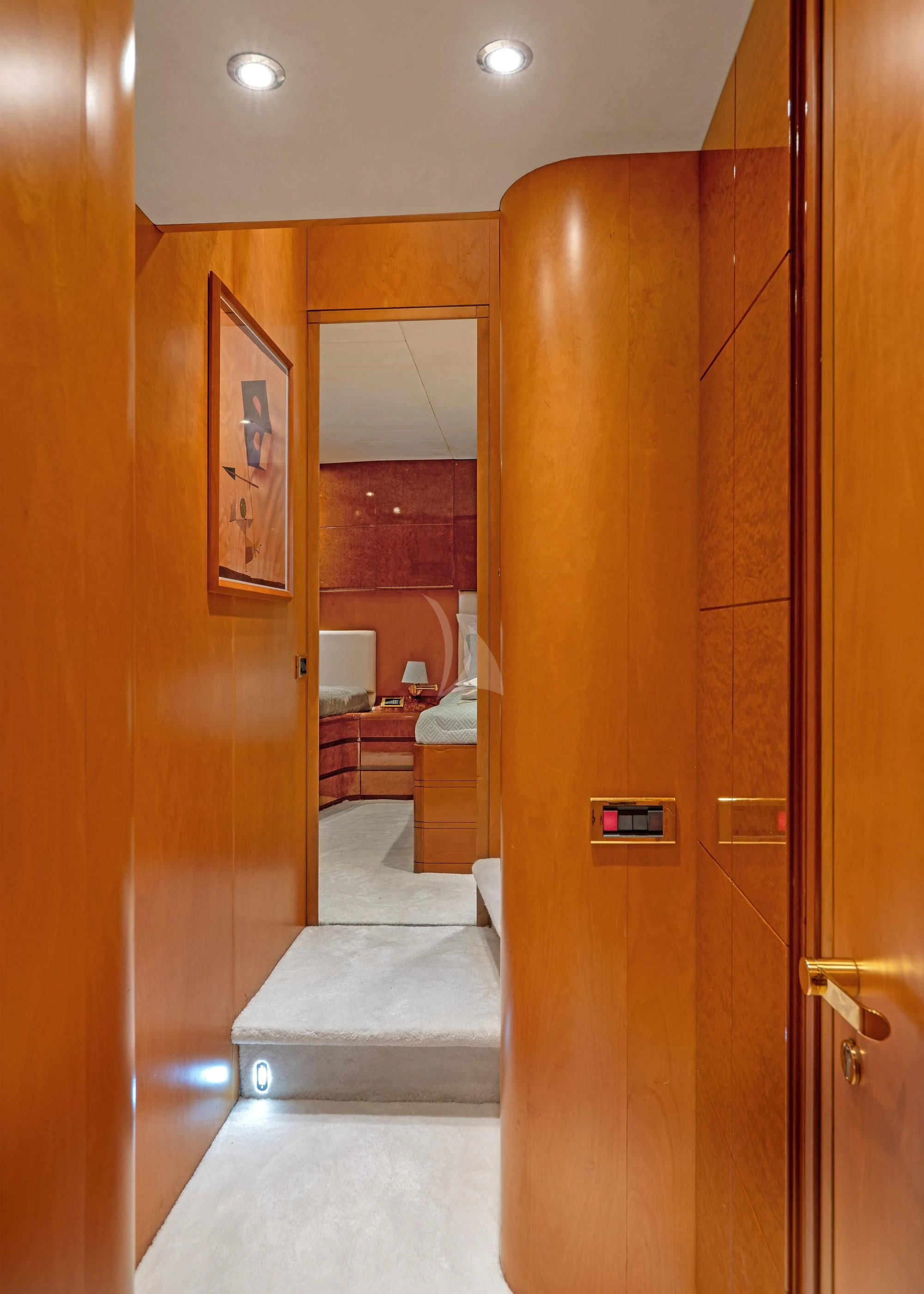 a bathroom with a wood door aboard ALANDINI Yacht for Sale