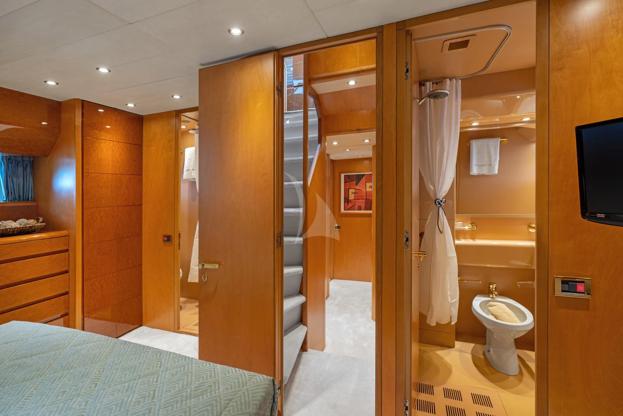 a bathroom with a bed and a mirror aboard ALANDINI Yacht for Sale