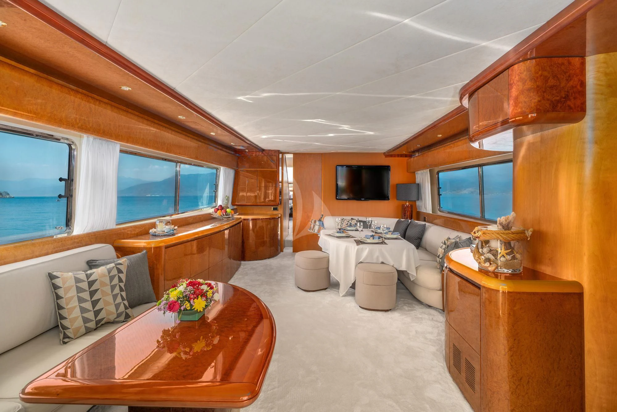 a large living room with a large window aboard ALANDINI Yacht for Sale