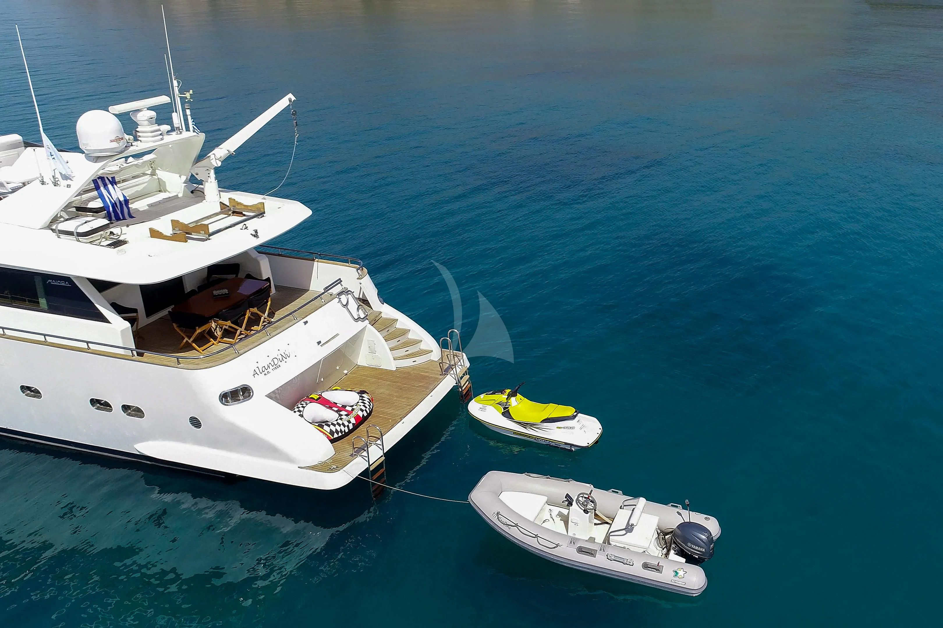 a group of boats in the water aboard ALANDINI Yacht for Sale