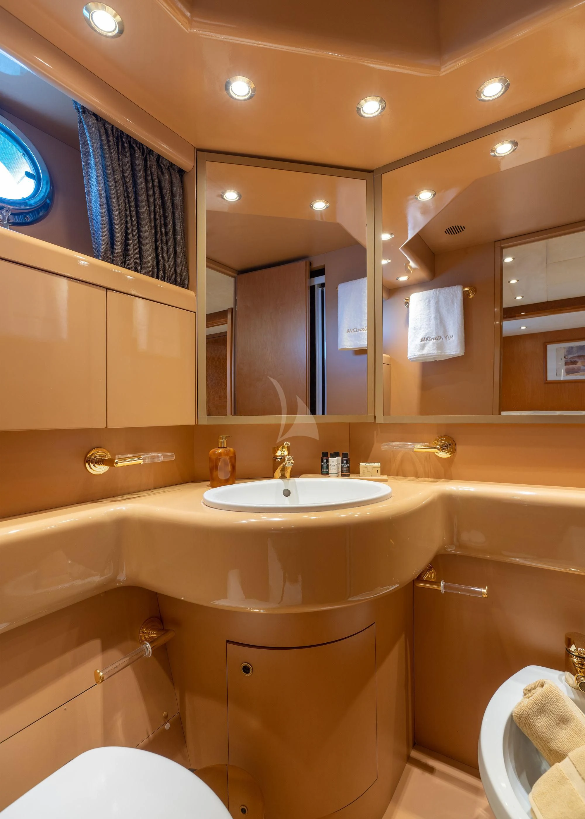 a bathroom with a sink and tub aboard ALANDINI Yacht for Sale