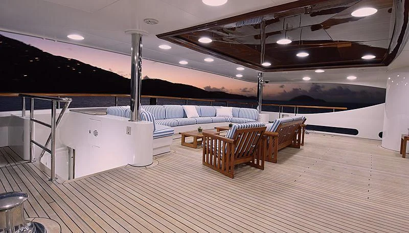a large room with a large wood floor and a large white projector aboard NEXT CHAPTER Yacht for Sale