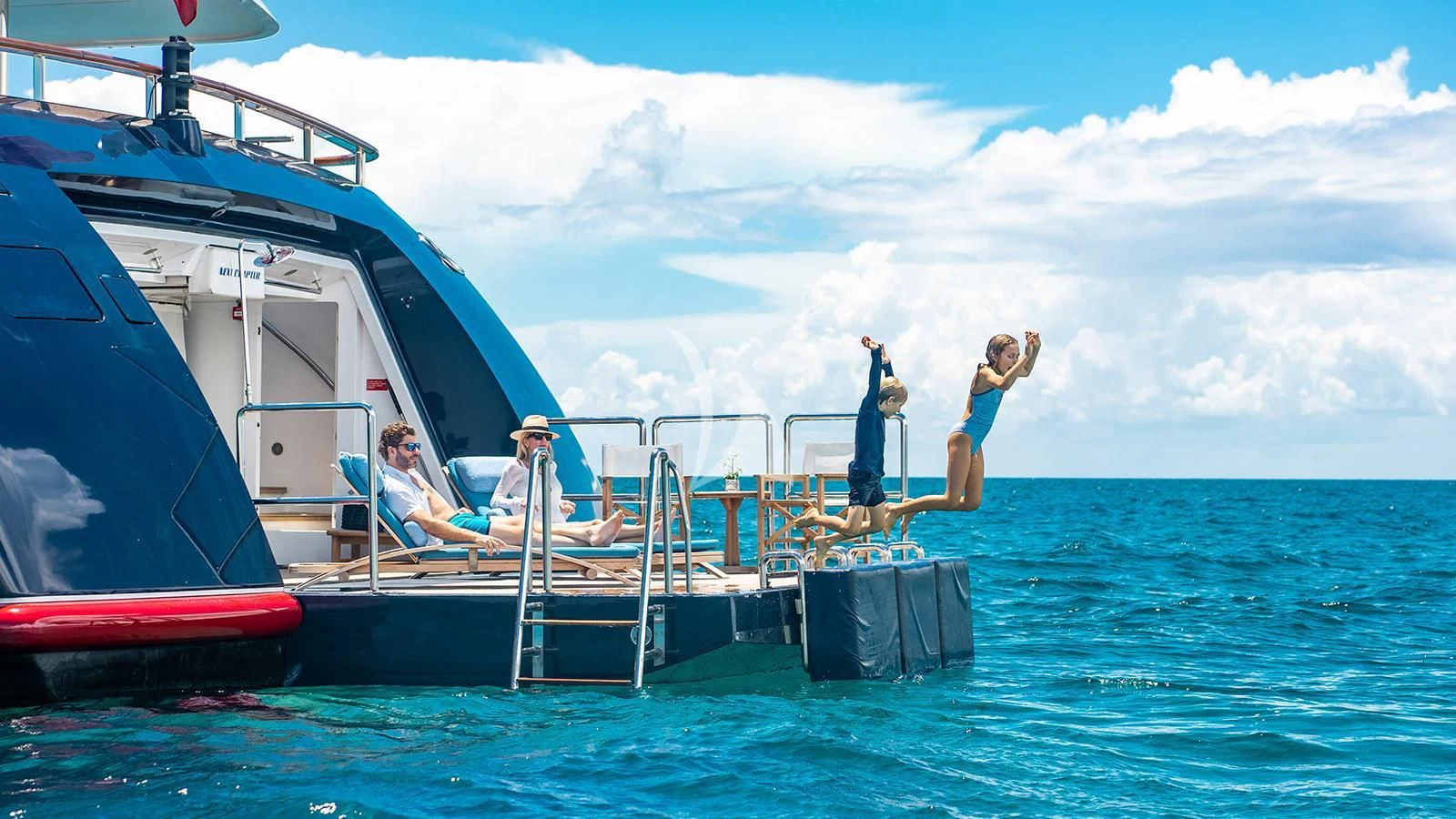 a group of people on a boat aboard NEXT CHAPTER Yacht for Sale