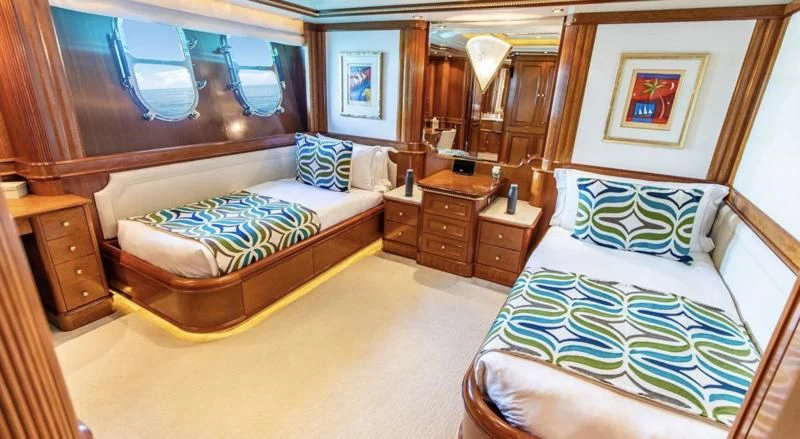 a room with two beds aboard NEXT CHAPTER Yacht for Sale