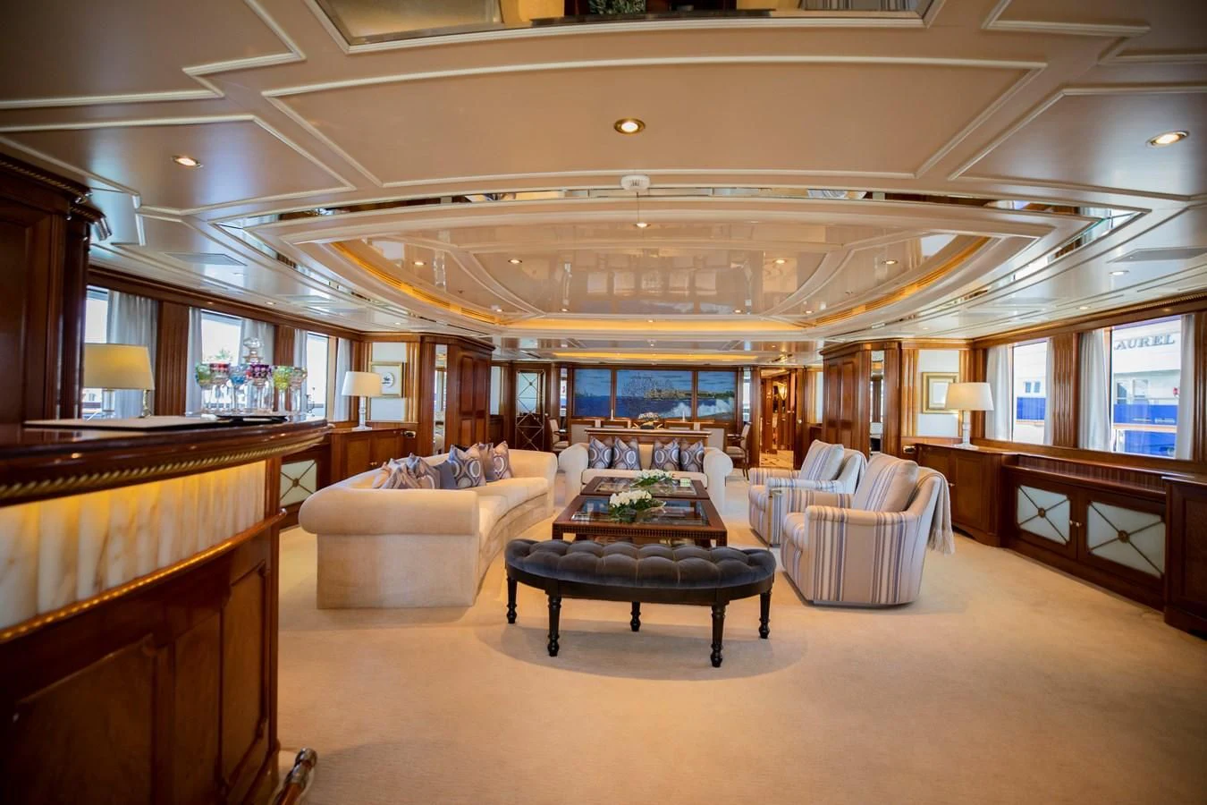 a large living room with a large glass ceiling aboard NEXT CHAPTER Yacht for Sale