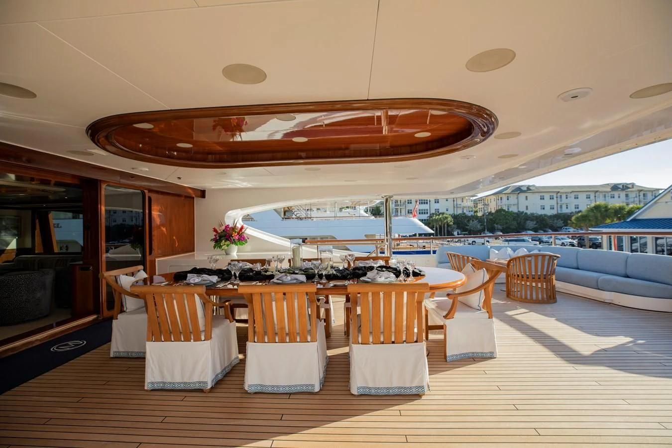 a room with tables and chairs aboard NEXT CHAPTER Yacht for Sale
