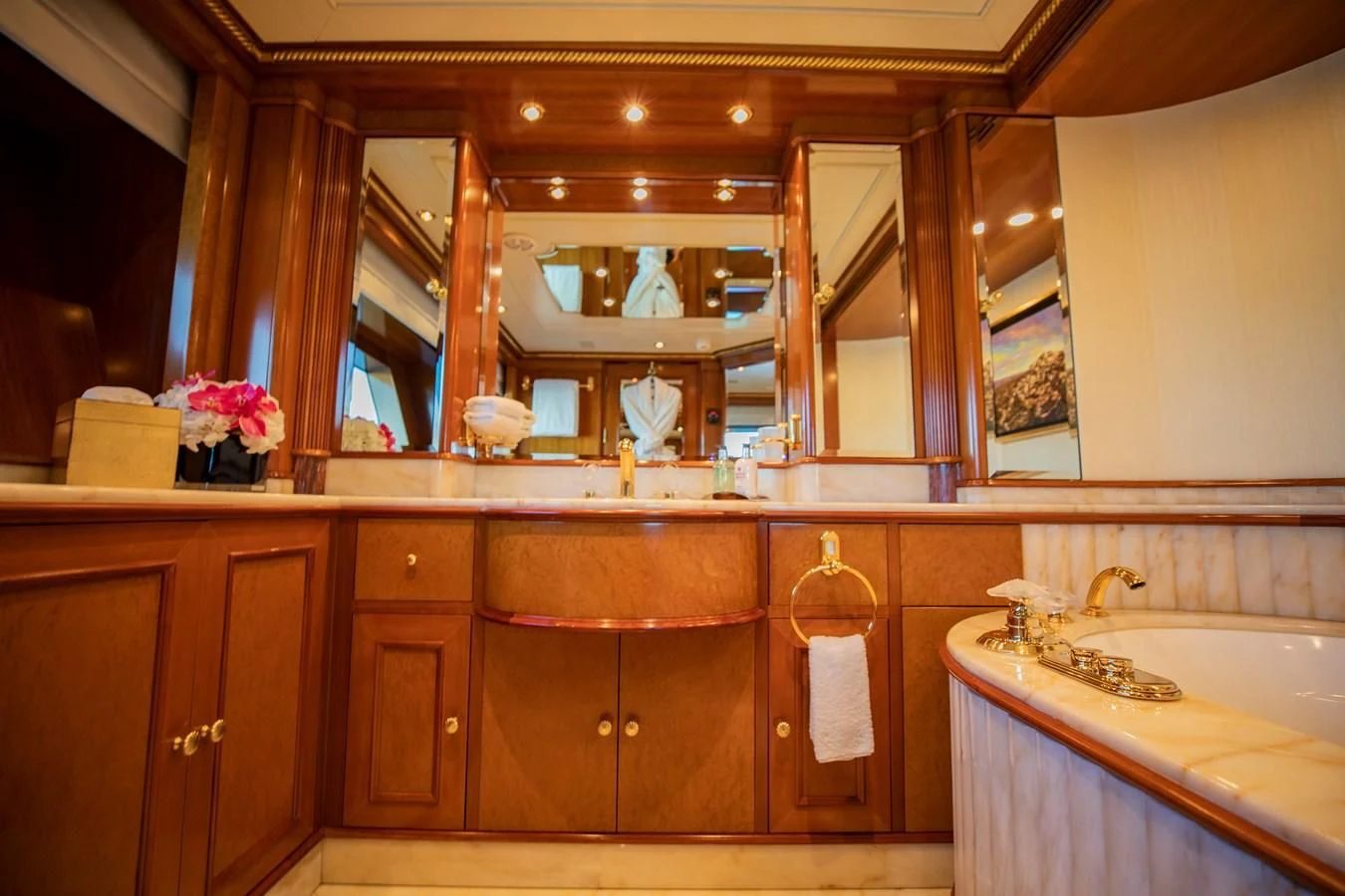 a bathroom with a large mirror aboard NEXT CHAPTER Yacht for Sale