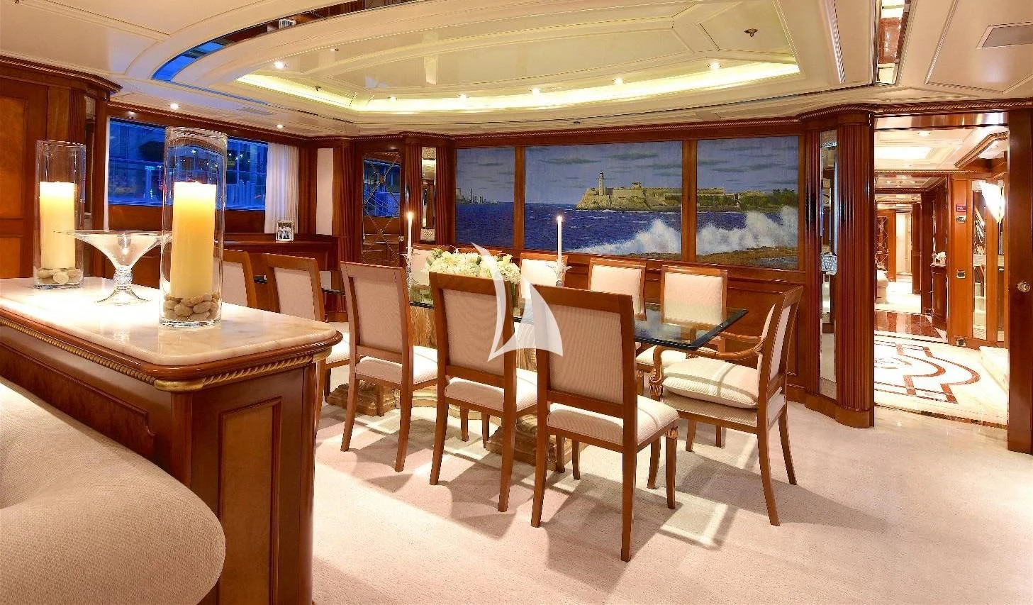 a restaurant with a table and chairs aboard NEXT CHAPTER Yacht for Sale