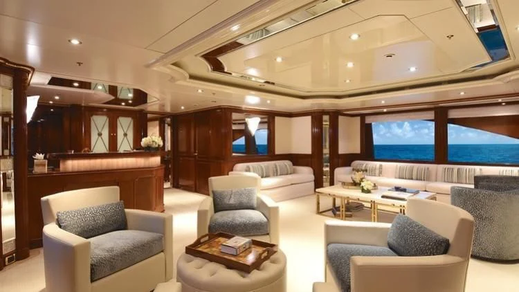 a room with a couch and a tv aboard NEXT CHAPTER Yacht for Sale
