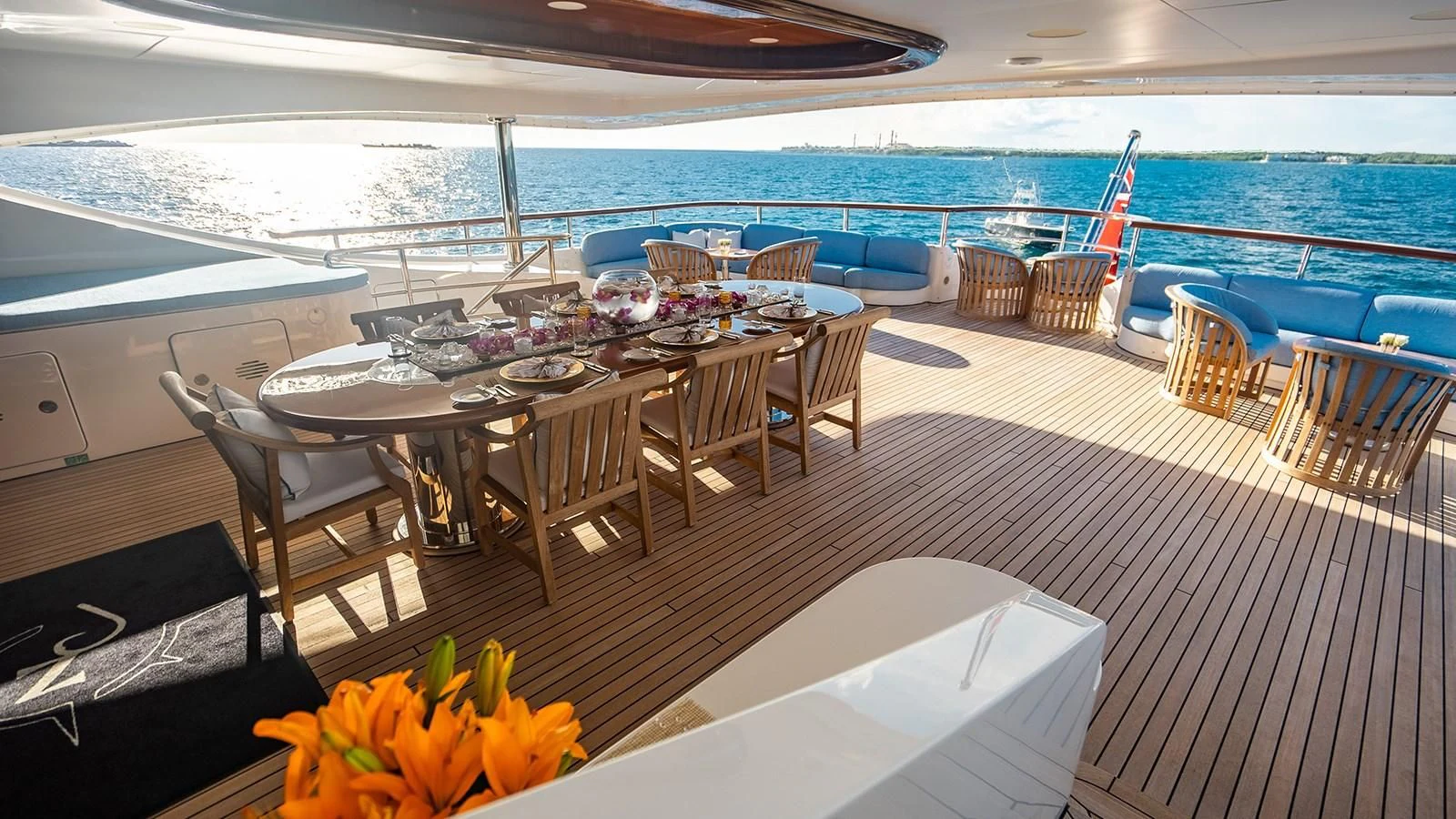 a room with tables and chairs aboard NEXT CHAPTER Yacht for Sale