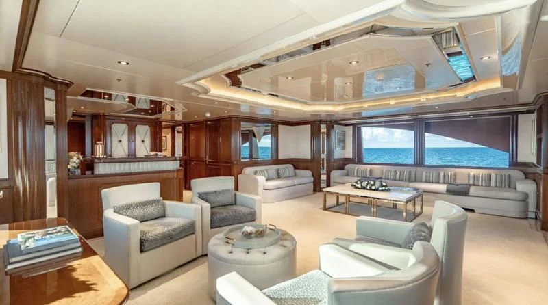 a living room with a large window aboard NEXT CHAPTER Yacht for Sale