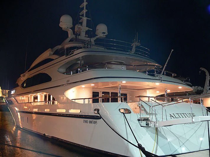 a large cruise ship at night aboard NEXT CHAPTER Yacht for Sale