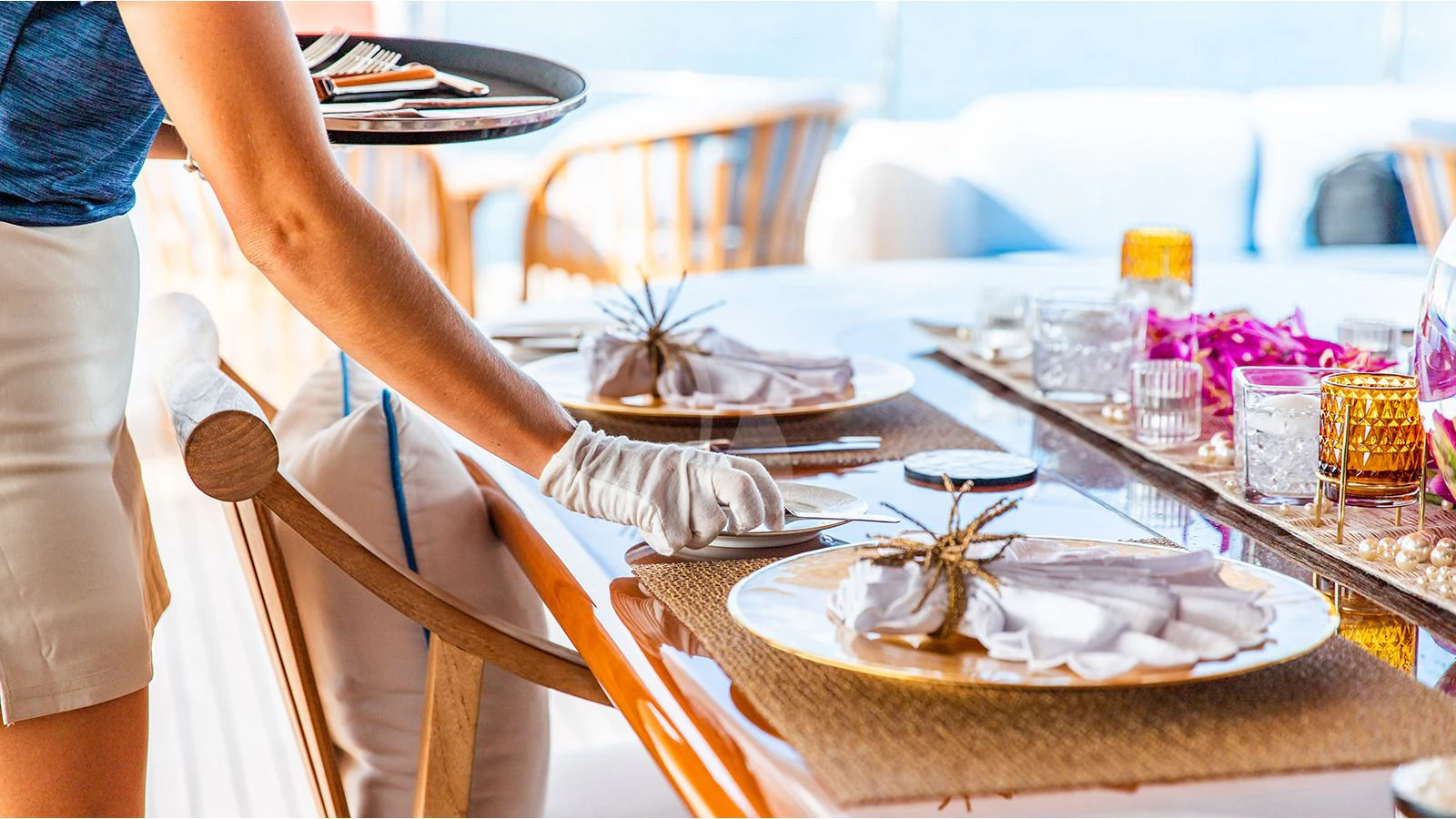 a person cutting a cake aboard NEXT CHAPTER Yacht for Sale