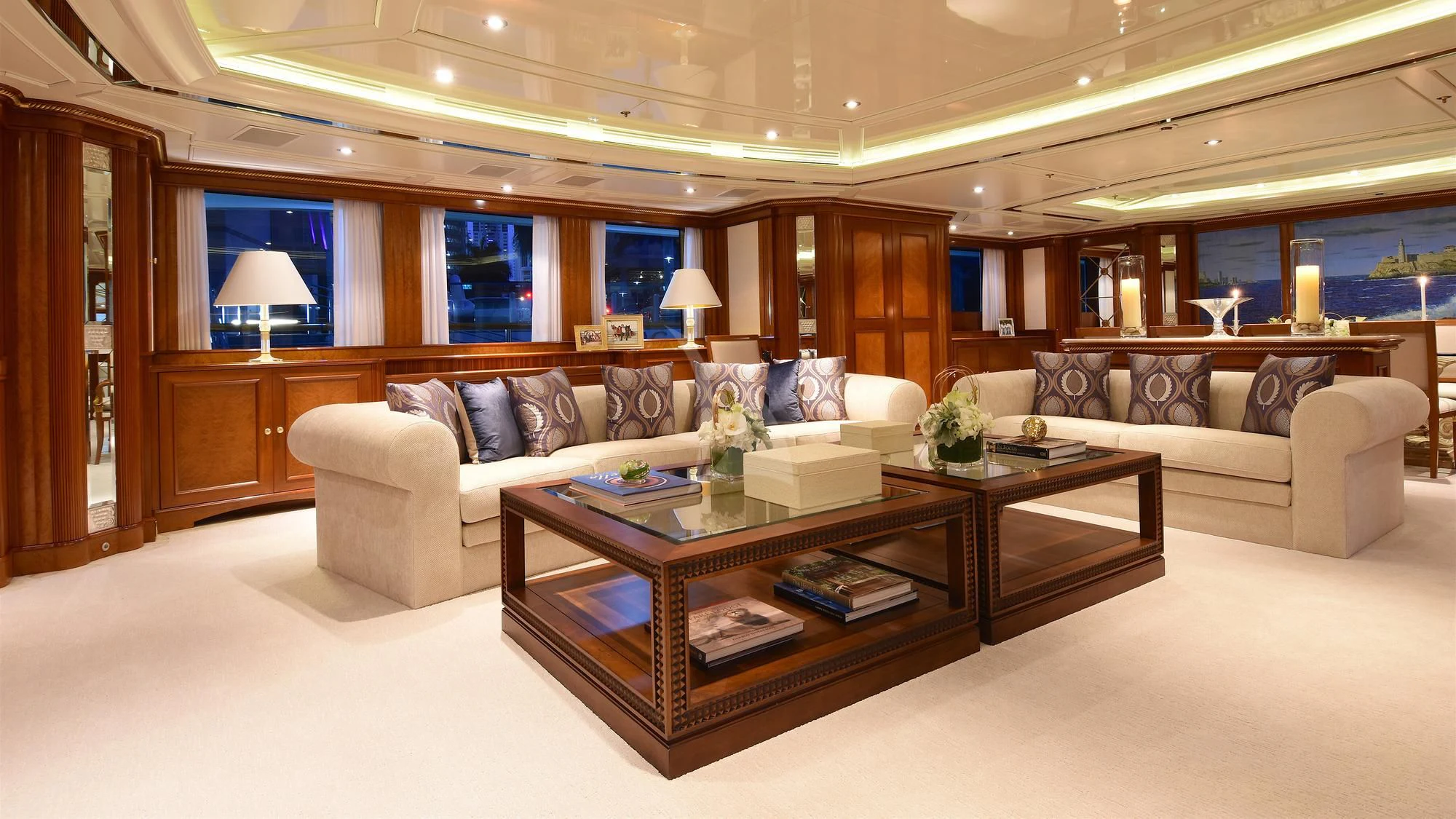 a living room with a couch and coffee table aboard NEXT CHAPTER Yacht for Sale