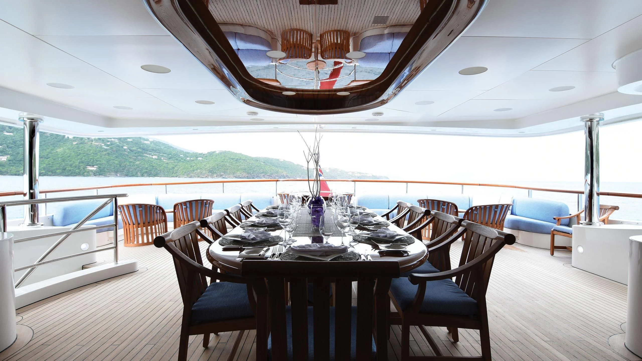 a dining table on a deck aboard NEXT CHAPTER Yacht for Sale