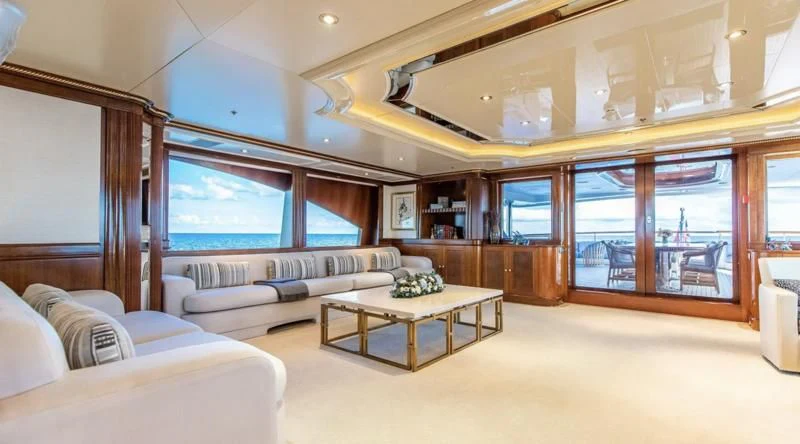 a living room with a large window aboard NEXT CHAPTER Yacht for Sale