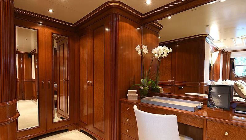a room with a desk and a tv aboard NEXT CHAPTER Yacht for Sale