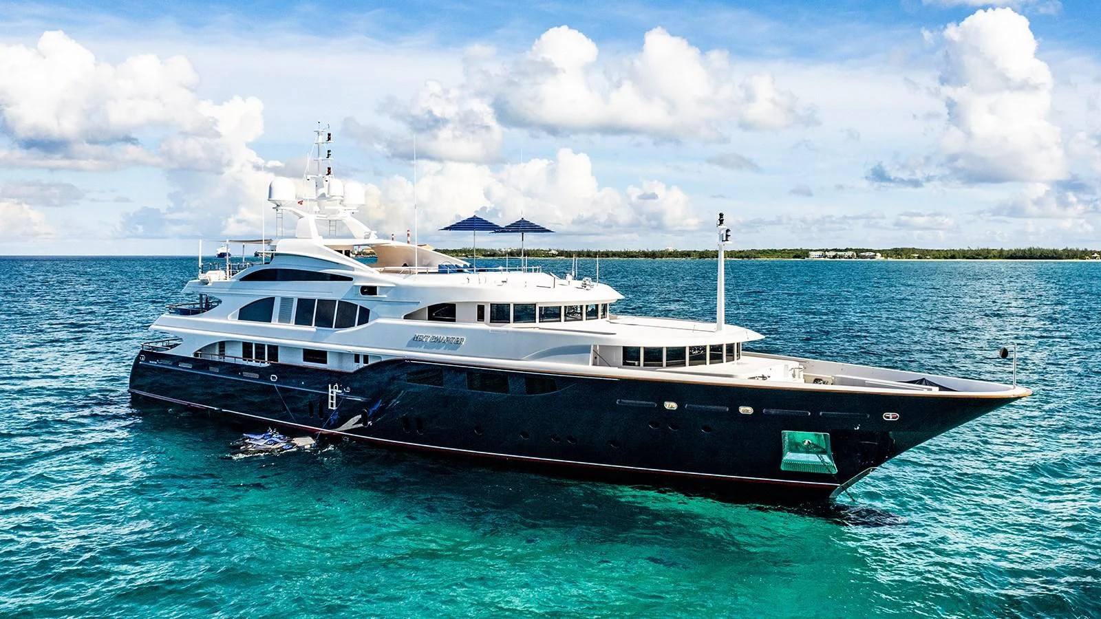 a large boat in the water aboard NEXT CHAPTER Yacht for Sale