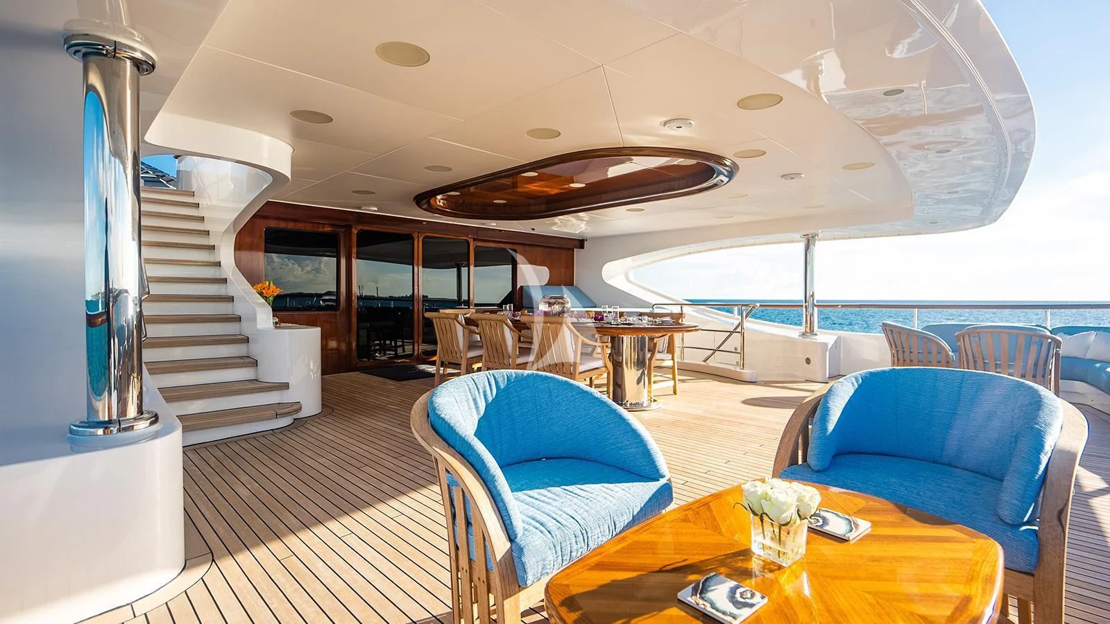 a living room with a staircase aboard NEXT CHAPTER Yacht for Sale