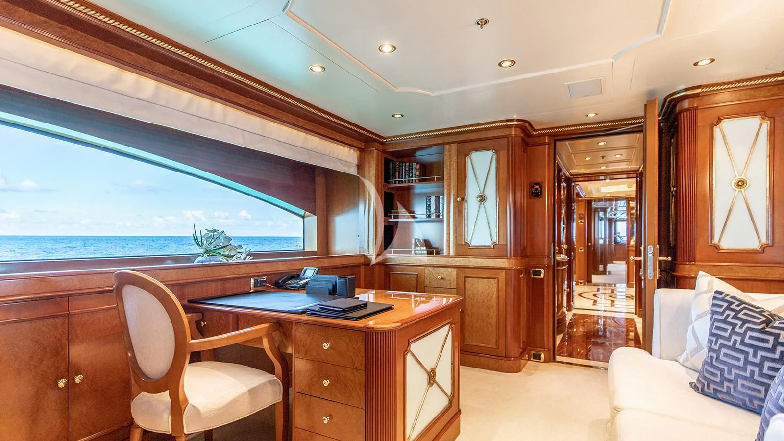 a room with a desk and a bed aboard NEXT CHAPTER Yacht for Sale