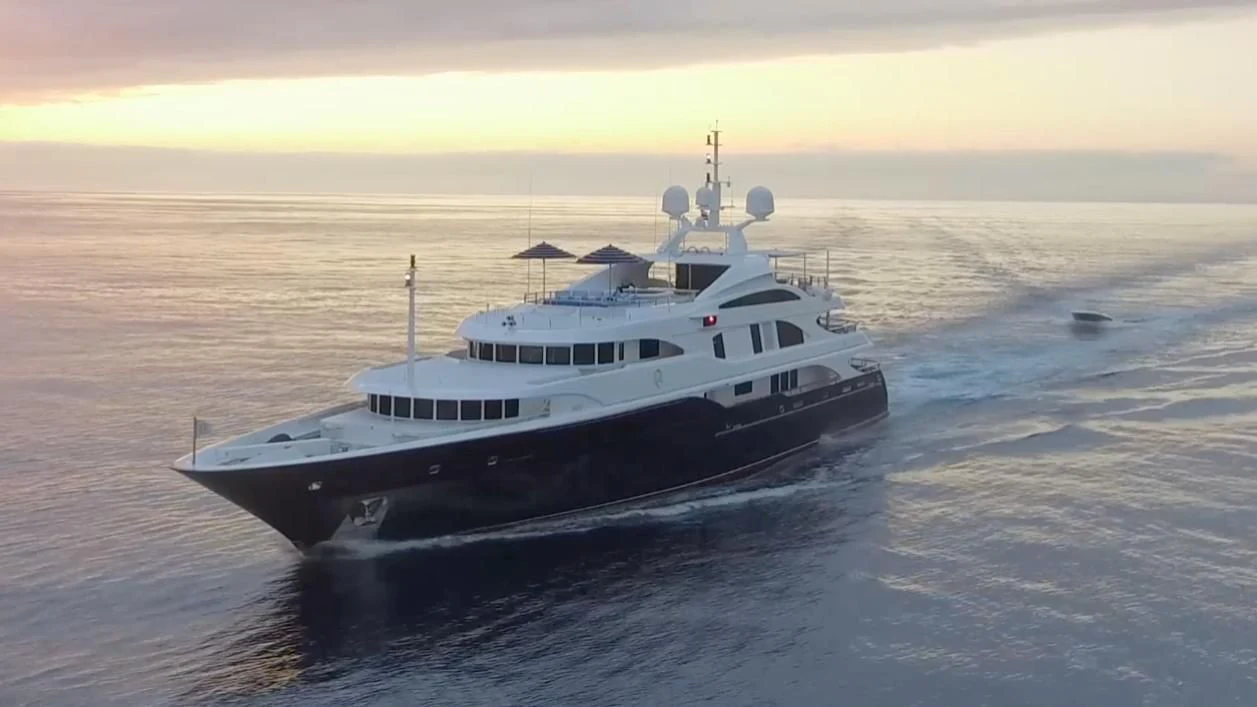 a large ship in the water aboard NEXT CHAPTER Yacht for Sale