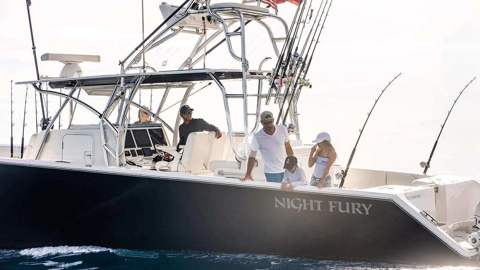 a group of people on a boat aboard NEXT CHAPTER Yacht for Sale